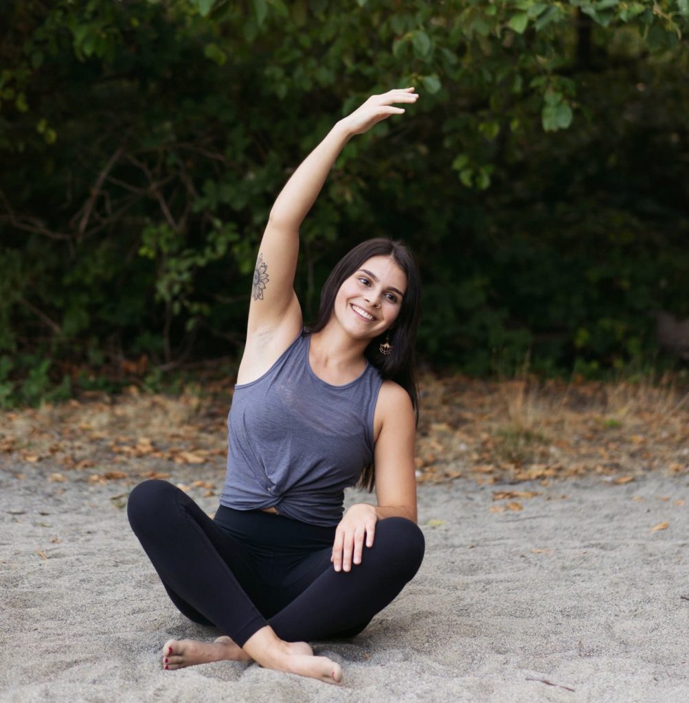 Megan Z in seated side bend.