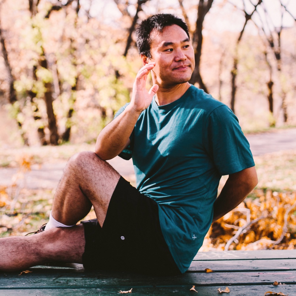 picture of a person doing a twist pose in the fall