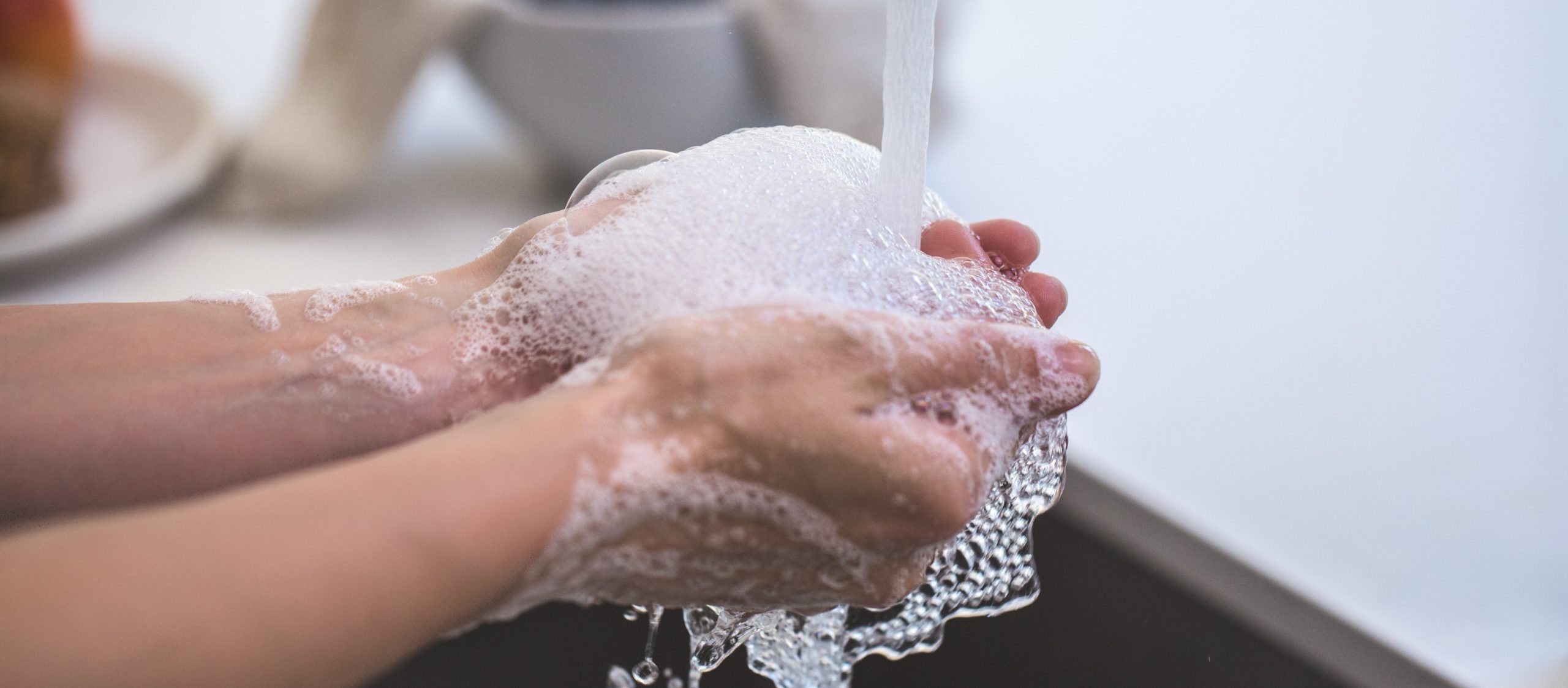 Person washing their hands