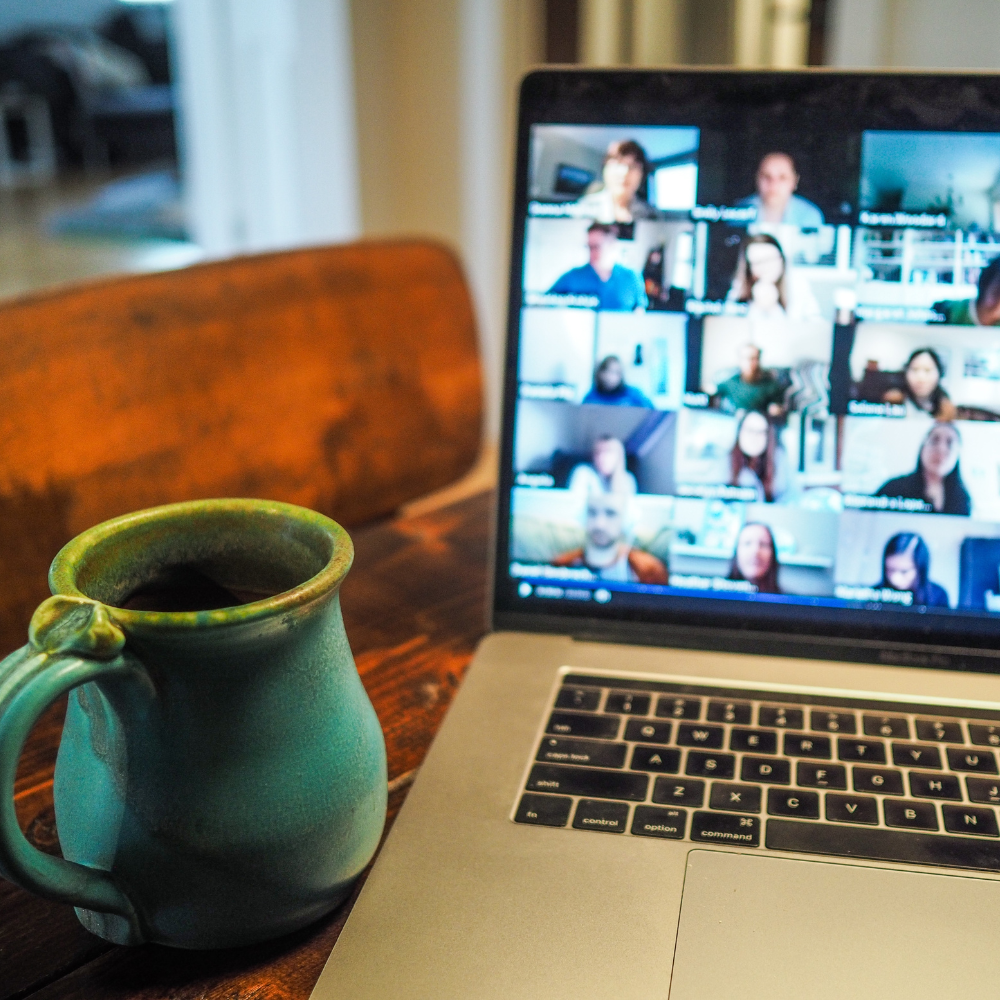 Photo of a computer with people learning via Zoom.