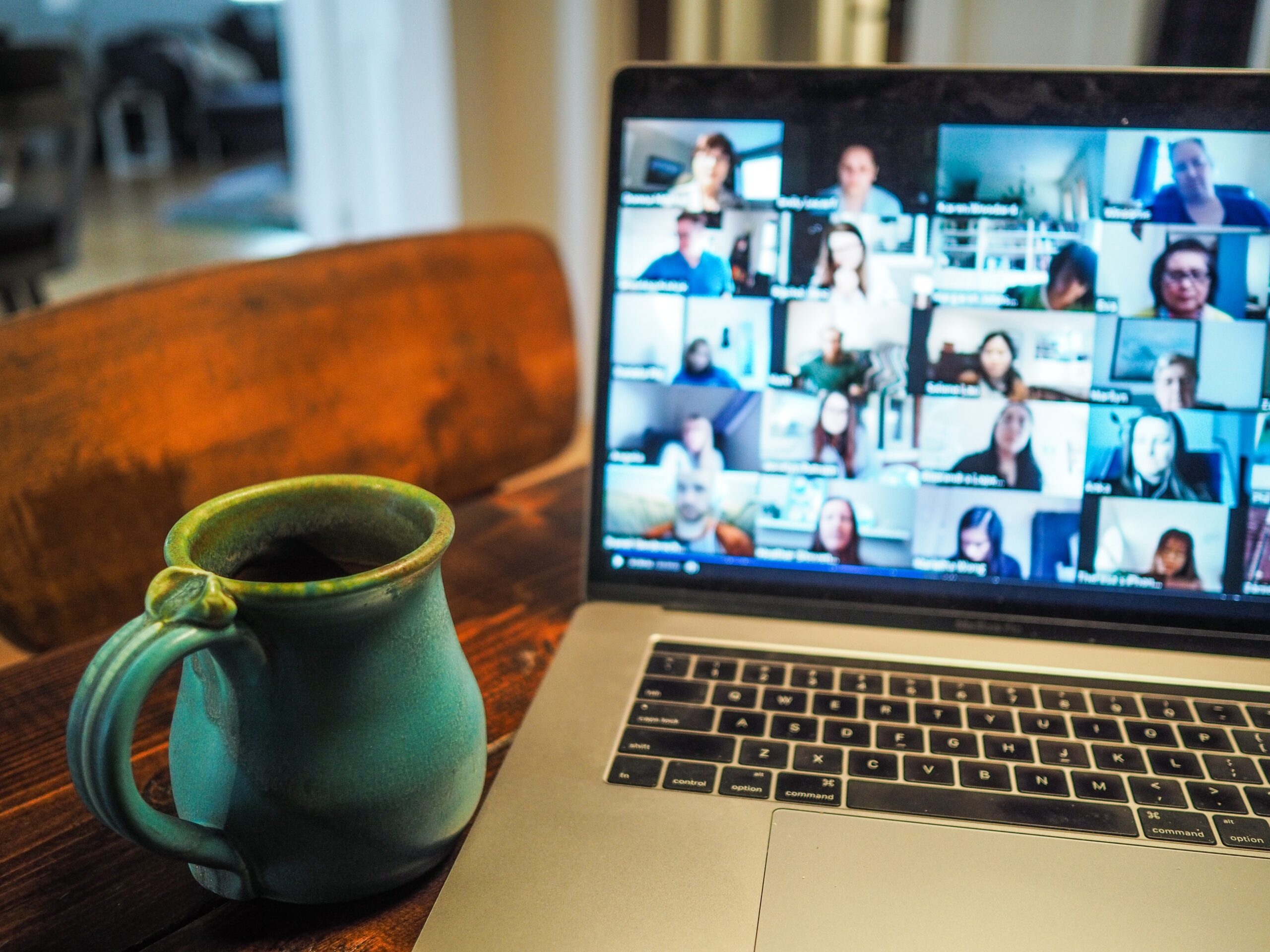 Photo of a computer screen with people learning via Zoom.
